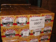Donated pancake mix ready for distribution.