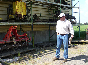 Tom Sweeney surveying equipment inventory prior  to planting time at Country Heritage Farms.